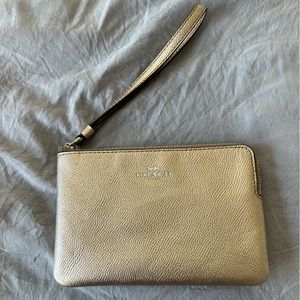 Coach wristlet. Rose gold